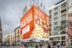 Rehabilitacion fachada con lona publicitaria - Portal de l'àngel 12